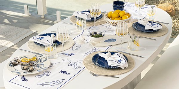Blue nautical styled outdoor table setting