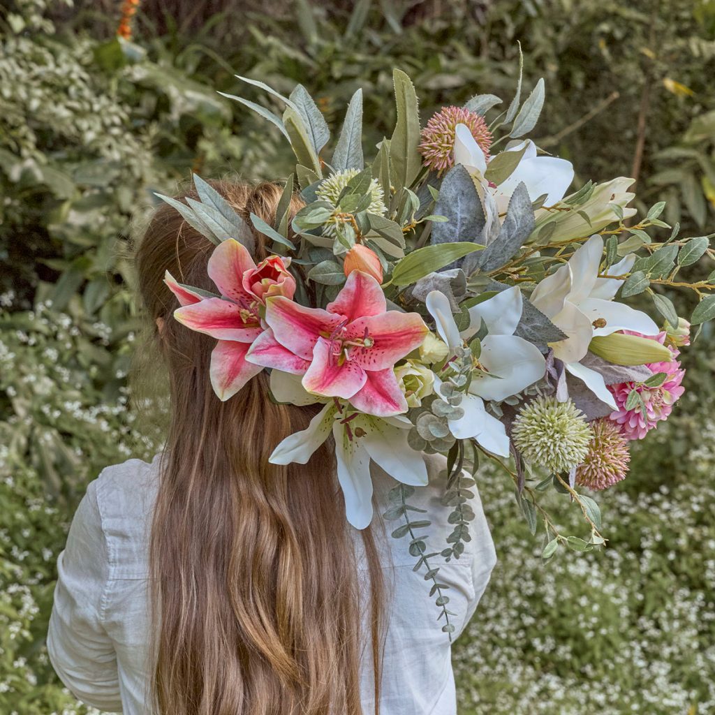 Lady Holding Faux Flowers