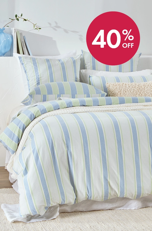 Blue and teal reversible stripe quilt cover set.