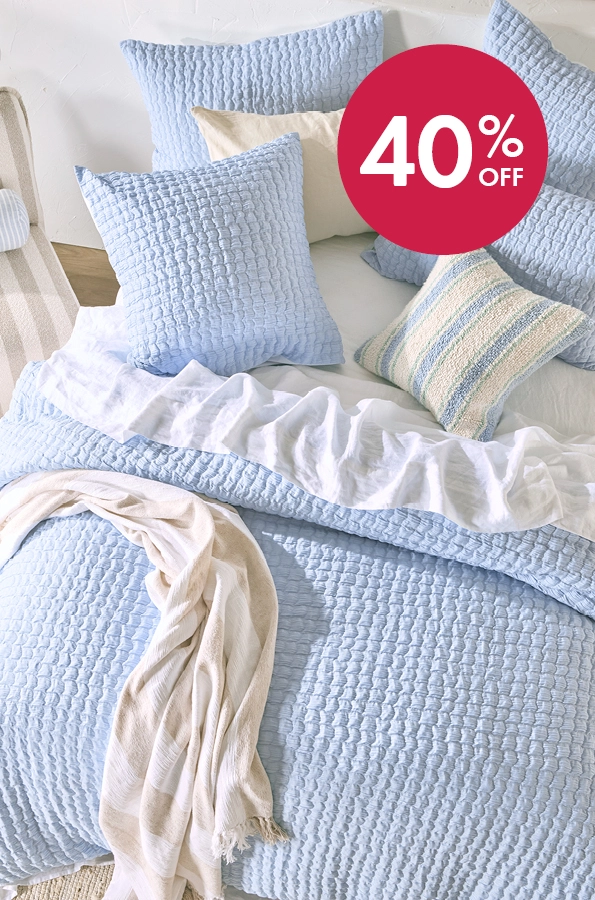 Light blue seersucker quilt cover set.
