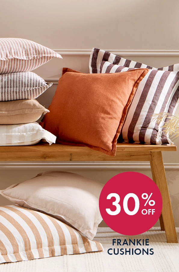 Frankie cushion range on wooden bench.