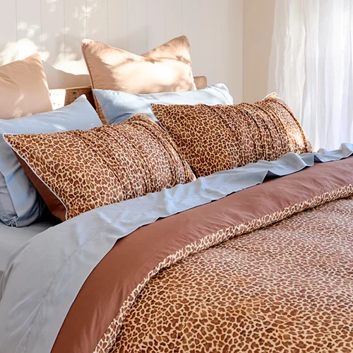 Leopard print quilt cover set with light blue sheets